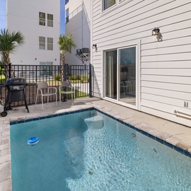 Your own private plunge pool awaits—perfect for cooling off after sunny beach days. Fire up the grill, relax with a drink, and enjoy the tropical palms framing your secluded oasis.