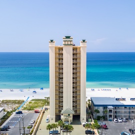 The property stands steps from sugar-white sand and brilliant turquoise waters, offering direct beach access for your coastal getaway.