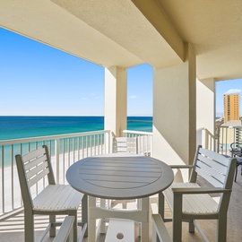 Your private balcony with stunning ocean views and outdoor dining - perfect for morning coffee or sunset cocktails.