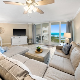 Unwind in your ocean-view living room with plush sectional seating and stunning sea vistas through sliding glass doors to your private balcony.