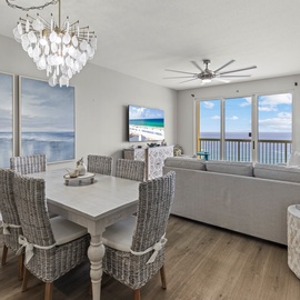 Relax in your elegant oceanfront living space where stunning sea views frame every moment through floor-to-ceiling windows.