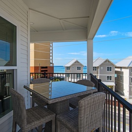 Your private balcony offers comfortable outdoor dining with stunning sea views—perfect for morning coffee or evening meals with the ocean breeze.