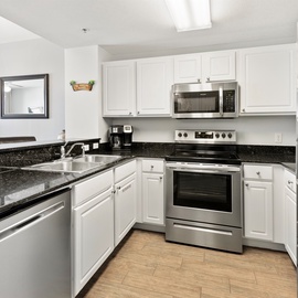 Your fully equipped kitchen features granite counters, stainless appliances, and everything needed to whip up delicious meals during your stay.