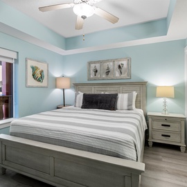 Drift into peaceful sleep in your serene bedroom, where soft aqua walls and coastal charm create the perfect retreat.