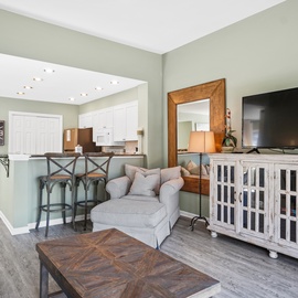 Relax in your open-concept living space with cozy seating and fully equipped kitchen—perfect for unwinding after exploring.