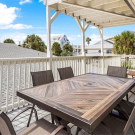 Your spacious covered deck offers the perfect spot for morning coffee or evening meals with neighborhood views.