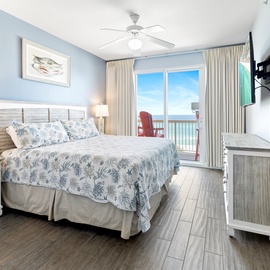 Wake up to stunning ocean views in your serene coastal bedroom, where sea-inspired décor and your private balcony create the perfect beachside retreat.