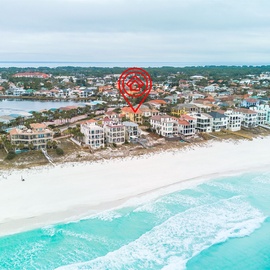 Stunning beachfront location just steps from pristine white sand and crystal-clear turquoise waters in this coastal community.