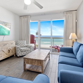 Relax in your bright coastal living room with ocean views and comfortable seating for memorable beachfront moments.