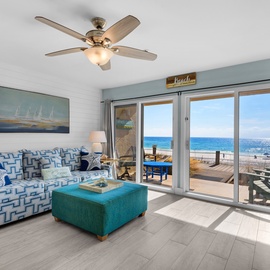 Step into your beach paradise where ocean views frame every moment from your stylish living room.