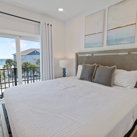 Wake up to the soft glow of coastal morning light flooding your bedroom. Step onto your private balcony and breathe in the ocean breeze—your beach escape begins here.