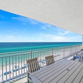Your private balcony offers breathtaking ocean views where turquoise waters meet pristine white sand—perfect for morning coffee or sunset relaxation.