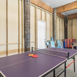 Challenge your travel companions to a friendly match in the game room, featuring table tennis and classic entertainment options for all ages.