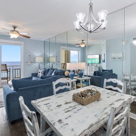 Relax in this bright, coastal-themed living space with ocean views from your private balcony and comfortable seating for the whole family.