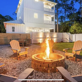 Gather around this magical fire pit for evening conversations under the stars, with comfortable seating perfect for s'mores and memories.