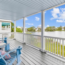Relax on your private covered deck with stunning water views, complete with comfortable seating for peaceful morning coffee or sunset cocktails.