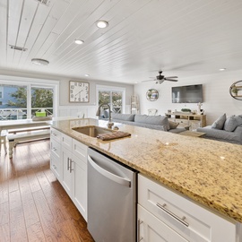 Your spacious kitchen opens beautifully into the living area, perfect for gathering with loved ones while you prepare meals.