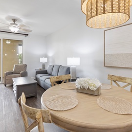 Relax in your bright, modern living space with coastal touches and balcony access for morning coffee.