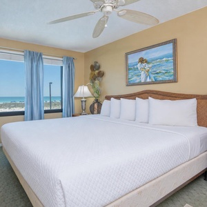 Awake to coastal views in this cozy master suite, perfect for relaxing after a day of beachside adventures