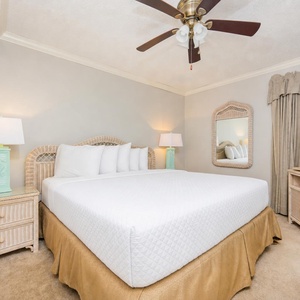 Drift into restful nights in the king suite, embraced by soft linens and surrounded by cozy, beach decor