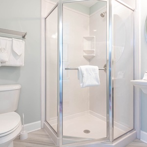 Freshen up in this guest bath in the relaxing shower before an exciting beach day