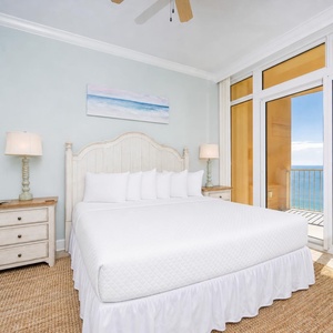 Awaken to refreshing coastal views as sunlight pours through the balcony windows of this king master suite