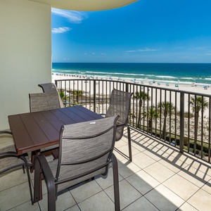 Salty breezes carry laughter from the beach below and gentle waves create a relaxing vibe