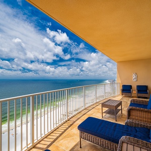 Breathe in the coastal breeze as you relax on the spacious balcony, soaking up panoramic views of the shore