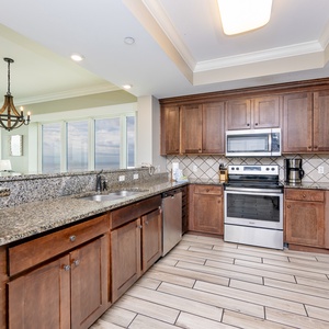 Craft delicious meals in the spacious kitchen, enhanced by stunning coast views through large windows