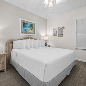 Drift into relaxation in the king suite, surrounded by beach decor that sets the perfect retreat vibe