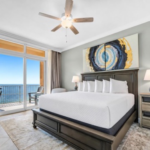 Feel the gulf breeze as you drift off on the plush king bed in this elegant master suite