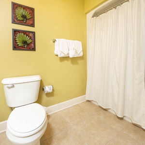 Refresh in the guest bath, with soft towels ready, and prepare for a fun beach day