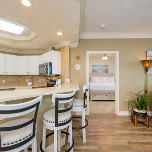 Gather with loved ones at the stylish breakfast bar, sharing laughs and leisure in this inviting space