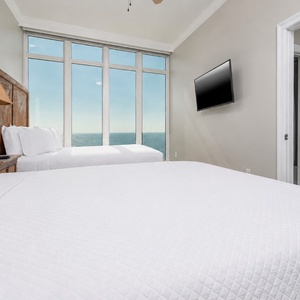 Unwind in this queen guest suite and stream your favorite shows or enjoy a good movie after a beach day