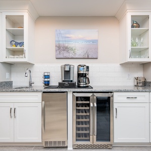 Enjoy preparing your favorite drink at the wet bar, with a Keurig and traditional coffee maker and wine cooler