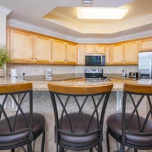 Gather around the inviting breakfast bar, where you'll enjoy laughter and cherished moments over your favorite drinks