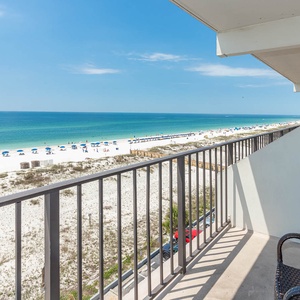 Enjoy stunning beachfront views from this inviting balcony, perfect for relaxing and soaking in the coastal atmosphere