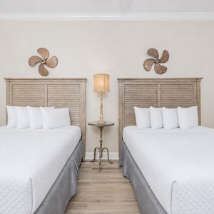Rejuvenate in this inviting guest room, featuring plush queen beds that cradle you in comfort for peaceful nights