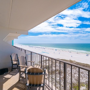 Bask in the sun from your balcony, enjoying stunning coastal views and the rhythmic sounds of beach life below