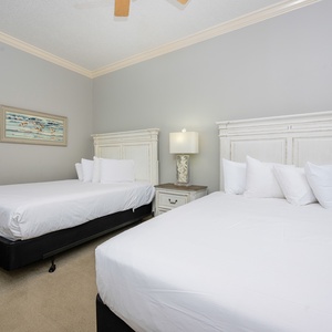 Relax on one of the cozy queen beds in this guest suite and enjoy a peaceful slumber