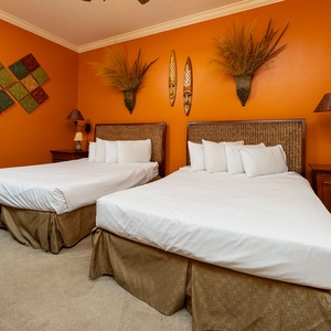 Relax on one of the cozy queen beds in this guest suite and enjoy a peaceful slumber