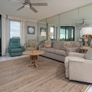 Relax in the inviting living area with a queen sofa sleeper and a view that invites tranquility and leisure