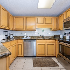 Prepare your favorite meals in this spacious kitchen featuring ample counter space and stainless appliances