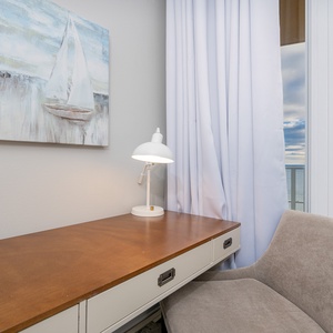 Get creative in this inspirational nook with a stunning view and coastal decor