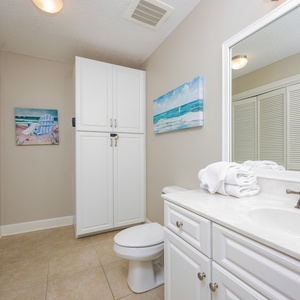 Refresh in this additional guest bath with a laundry area with a washer and dryer in your rental