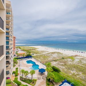 Take in the beach view and relax by the pool surrounded by lush landscaping and inviting lounge areas