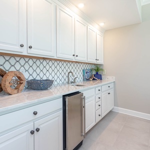 Grab a chilled drink from the fridge or create your favorite cocktail at the wet bar