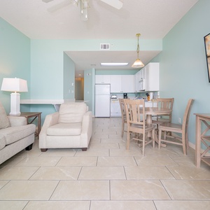 Open concept living featuring a seamless flow between the living room, dining area, and kitchen