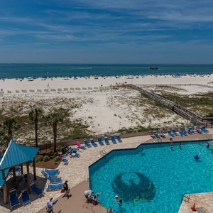 Enjoy the coastal sights and sounds of a beach day from your balcony