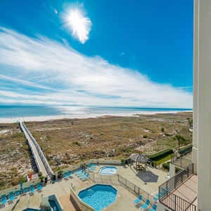 Soak in the vibrant views from your balcony, feeling the coastal vibe and warmth of the sun on your skin